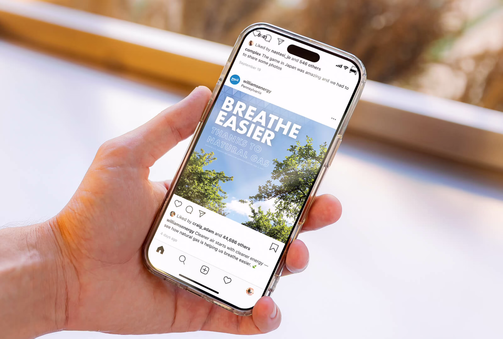 Phone with Williams Energy social media creative