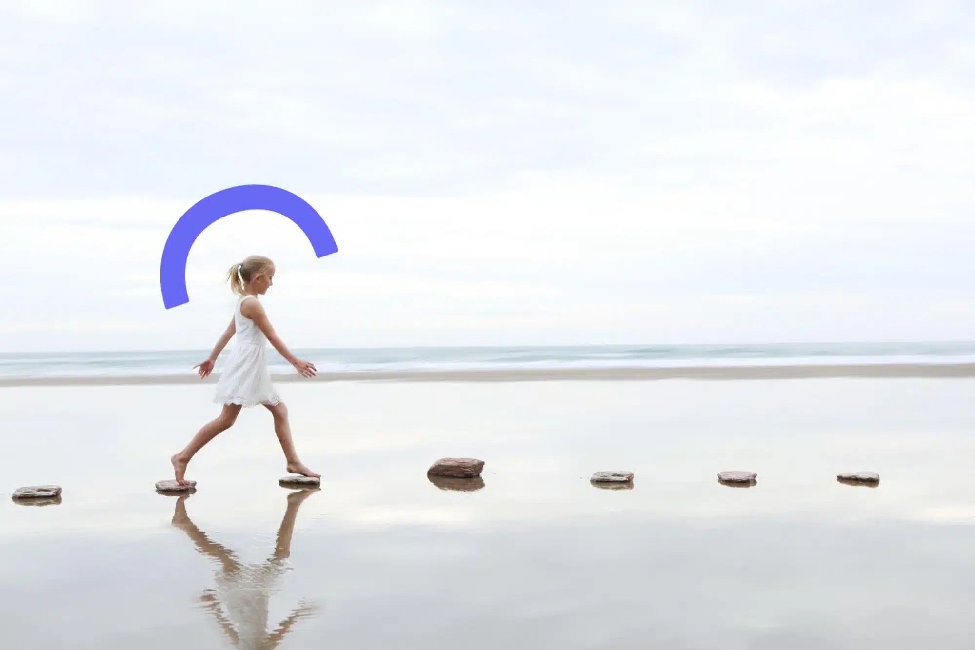 Pennie ARP A young girl in a white dress walking across a line of stepping stones on a calm beach.
